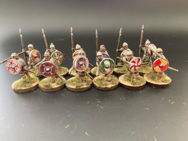 saxon thegns with shields, 12 figures.