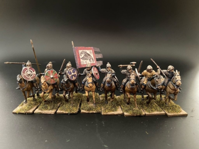8 Mounted Saxon Thegns with banners and weapons.