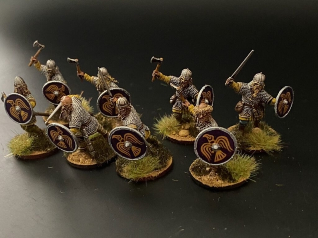 small group shot of professionally painted and based Victrix Viking figures.