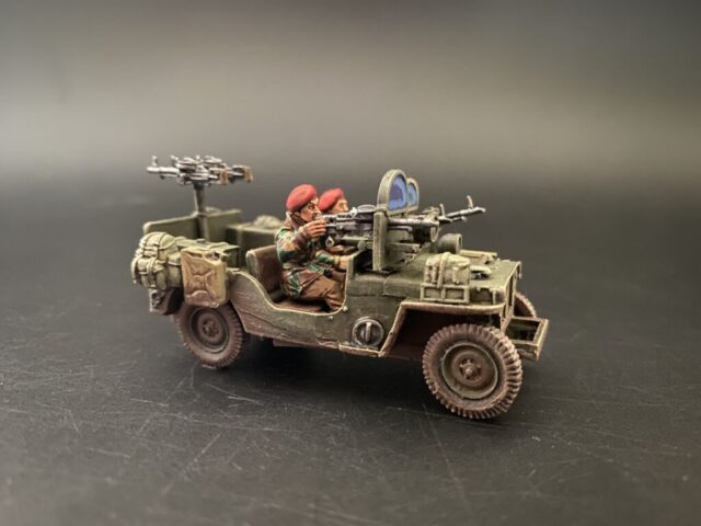 side view of paratroopers jeep.